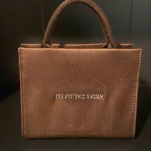 Brandon Blackwood’s “End Systematic Racism” tote bag.
